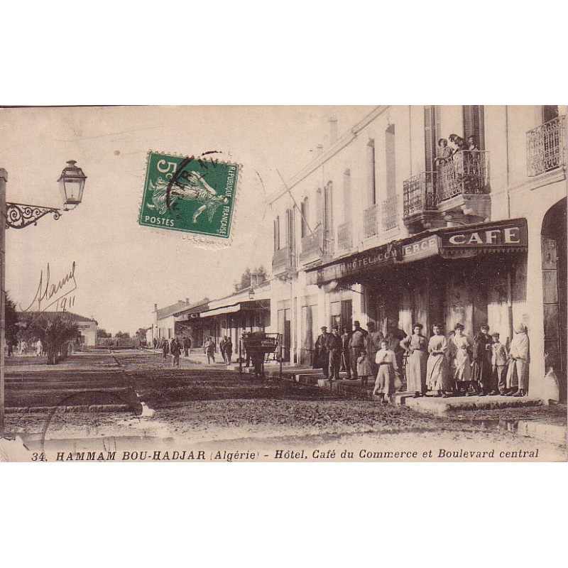 HAMMAM BOU-HADJAR - HOTEL CAFE DU COMMERCE ET BOULEVARD CENTRAL - ANIMATION - CARTE DATEE DE 1911 - RARE.