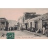 ORAN - UNE RUE AU VILLAGE NEGRE - MAGASIN - EPICERIE - TABACS - ANIMATION - CARTE DATEE DE 1909.