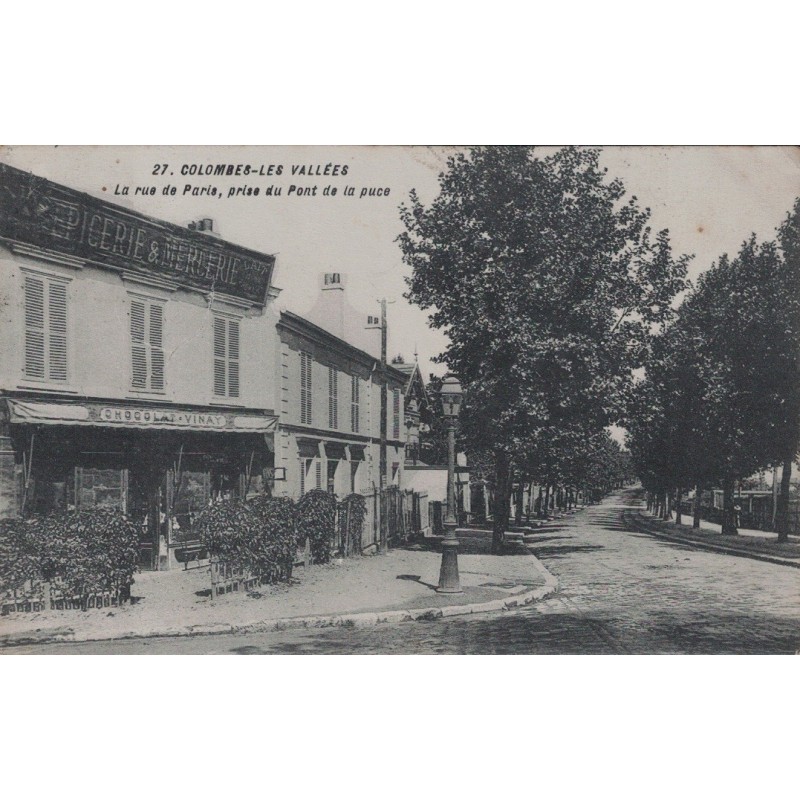 COLOMBES-LES VALLEES - LA RUE DE PARIS PRISE DU PONT DE LA PUCE - CARTE DATEE DE 1910.
