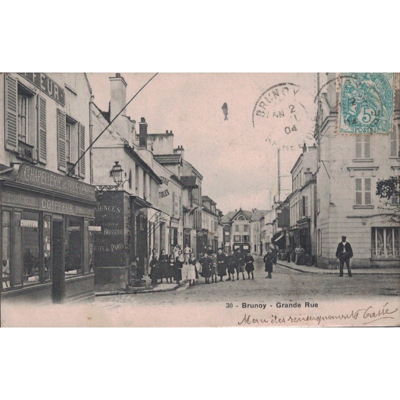 BRUNOY - GRANDE RUE - LA CHAPELLERIE COIFFEUR PARFUMERIE - ANIMATION - CARTE DATEE DE 1904.