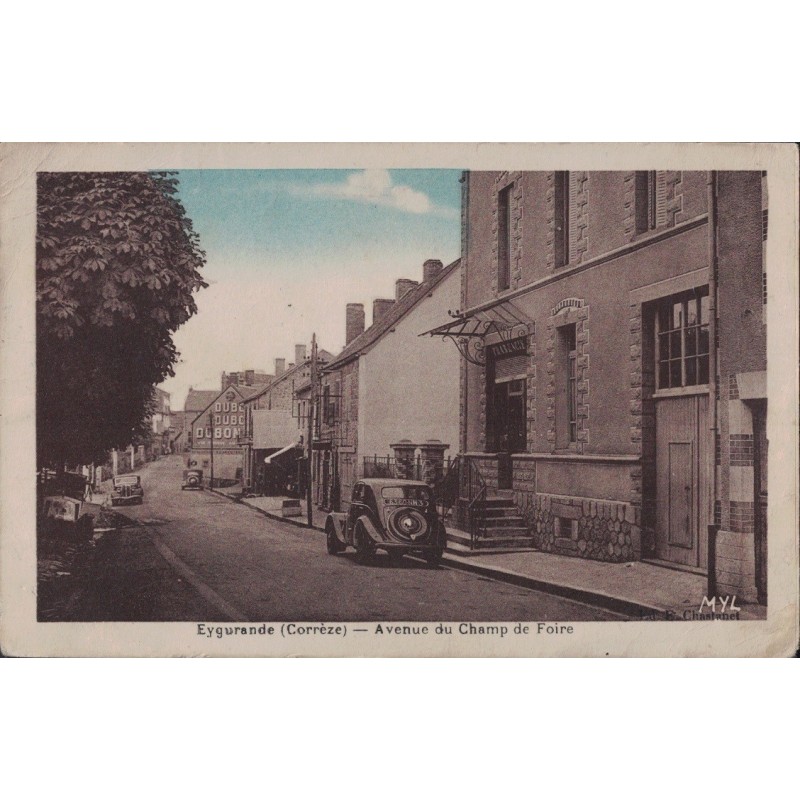 EYGURANDE - AVENUE DU CHAMP DE FOIRE - PHARMACIE A DROITE - VOITURE - CARTE DATEE DE 1938.